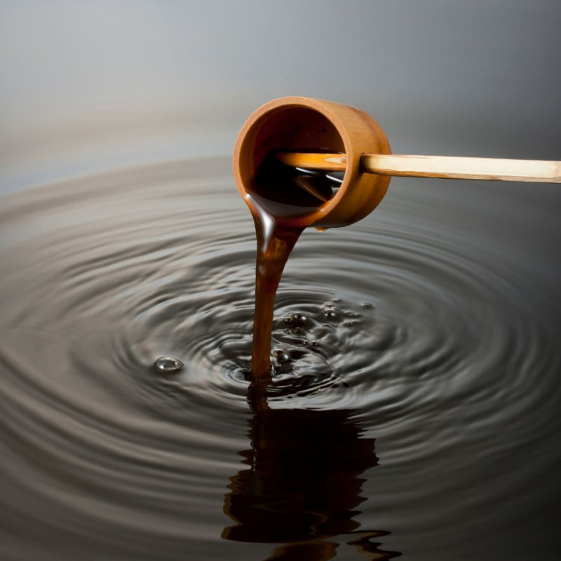 moromi vinegar being poured close up